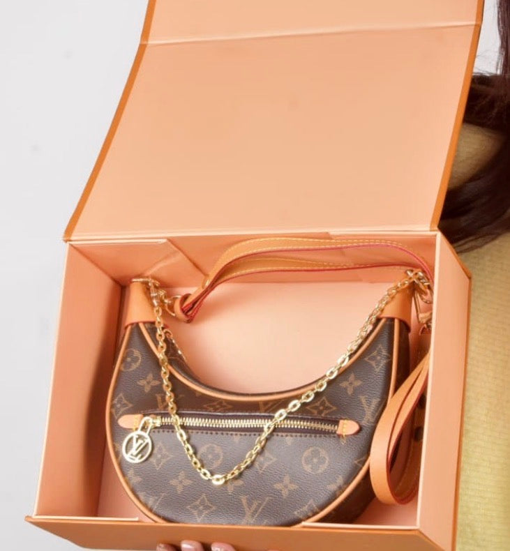 Vora Monogram Crescent Shoulder Bag mirror